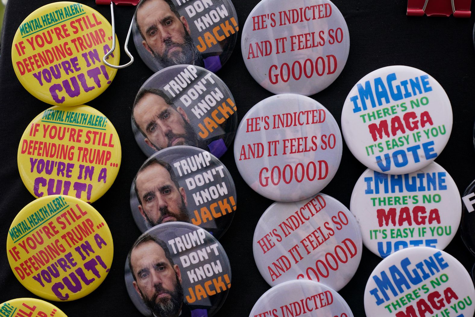 Buttons are on display outside the courthouse.