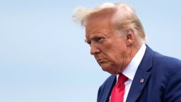 Former President Donald Trump arrives at Ronald Reagan Washington National Airport, Thursday, Aug. 3, 2023, in Arlington, Va., as he heads to Washington to face a judge on federal conspiracy charges alleging Trump conspired to subvert the 2020 election. (AP Photo/Alex Brandon)