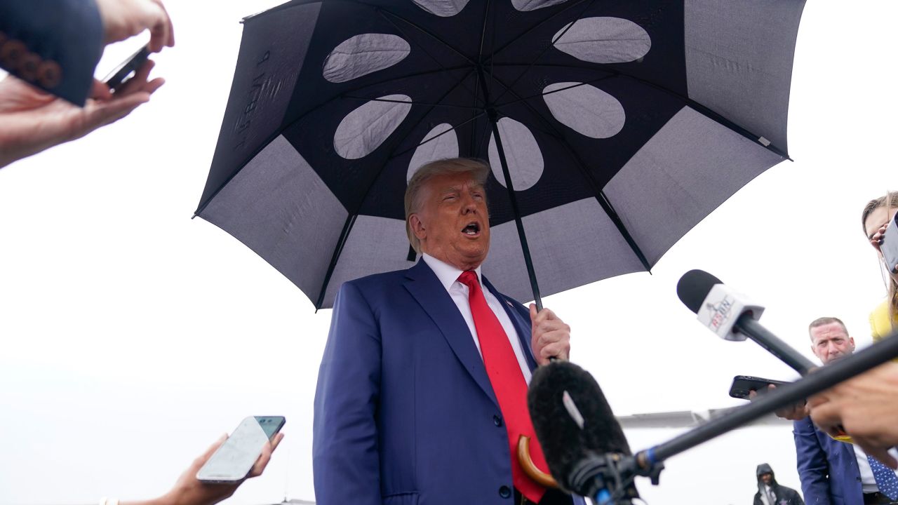 Former President Donald Trump speaks before he boards his plane at Ronald Reagan Washington National Airport, Thursday, Aug. 3, 2023, in Arlington, Va., after facing a judge on federal conspiracy charges that allege he conspired to subvert the 2020 election. (AP Photo/Alex Brandon)