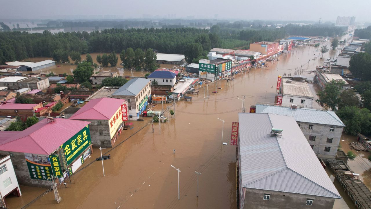 Floods inundate a village in Baoding city, Hebei province, on August 2, 2023. 
