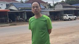 Chinese rights lawyer Lu Siwei poses on a road, at an undisclosed location, around 300 kilometers (186 miles) north of Vientiane, Laos, Thursday, July 27, 2023.