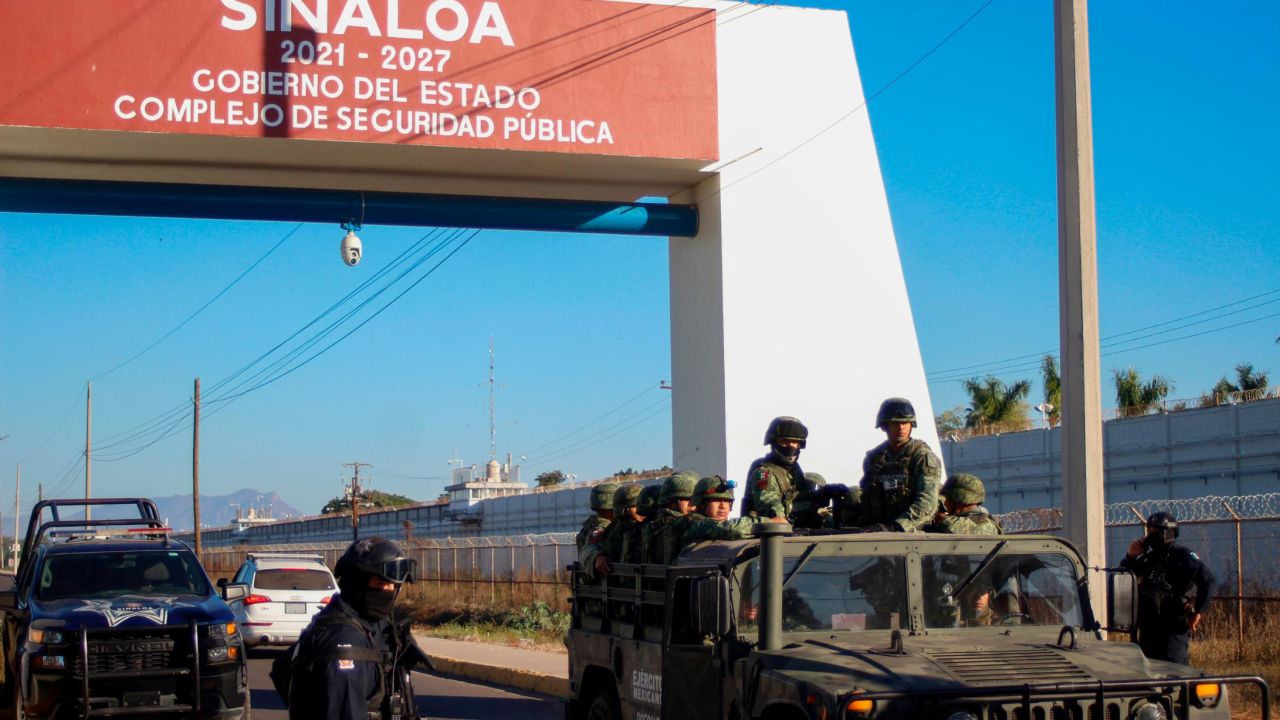 In this January 2023 photo, police and military patrol Culiacan, Sinaloa state, Mexico. With Sinaloa cartel boss Joaquín "El Chapo" Guzmán serving a life sentence, his sons steered the family business into fentanyl, establishing a network of labs churning out massive quantities they smuggled into the US.