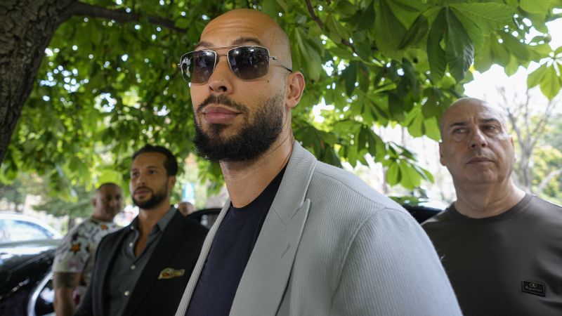 NextImg:Controversial influencer Andrew Tate released from house arrest in Romania | CNN