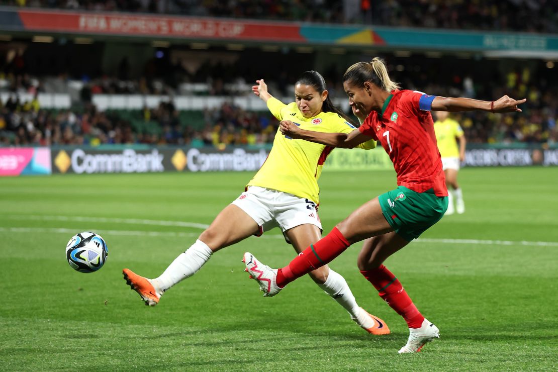 PERTH, AUSTRALIA - AUGUST 03: Ghizlane Chebbak of Morocco crosses the ball while Lorena Bedoya Durango of Colombia attempts to block during the FIFA Women's World Cup Australia & New Zealand 2023 Group H match between Morocco and Colombia at Perth Rectangular Stadium on August 03, 2023 in Perth, Australia. (Photo by Paul Kane/Getty Images)