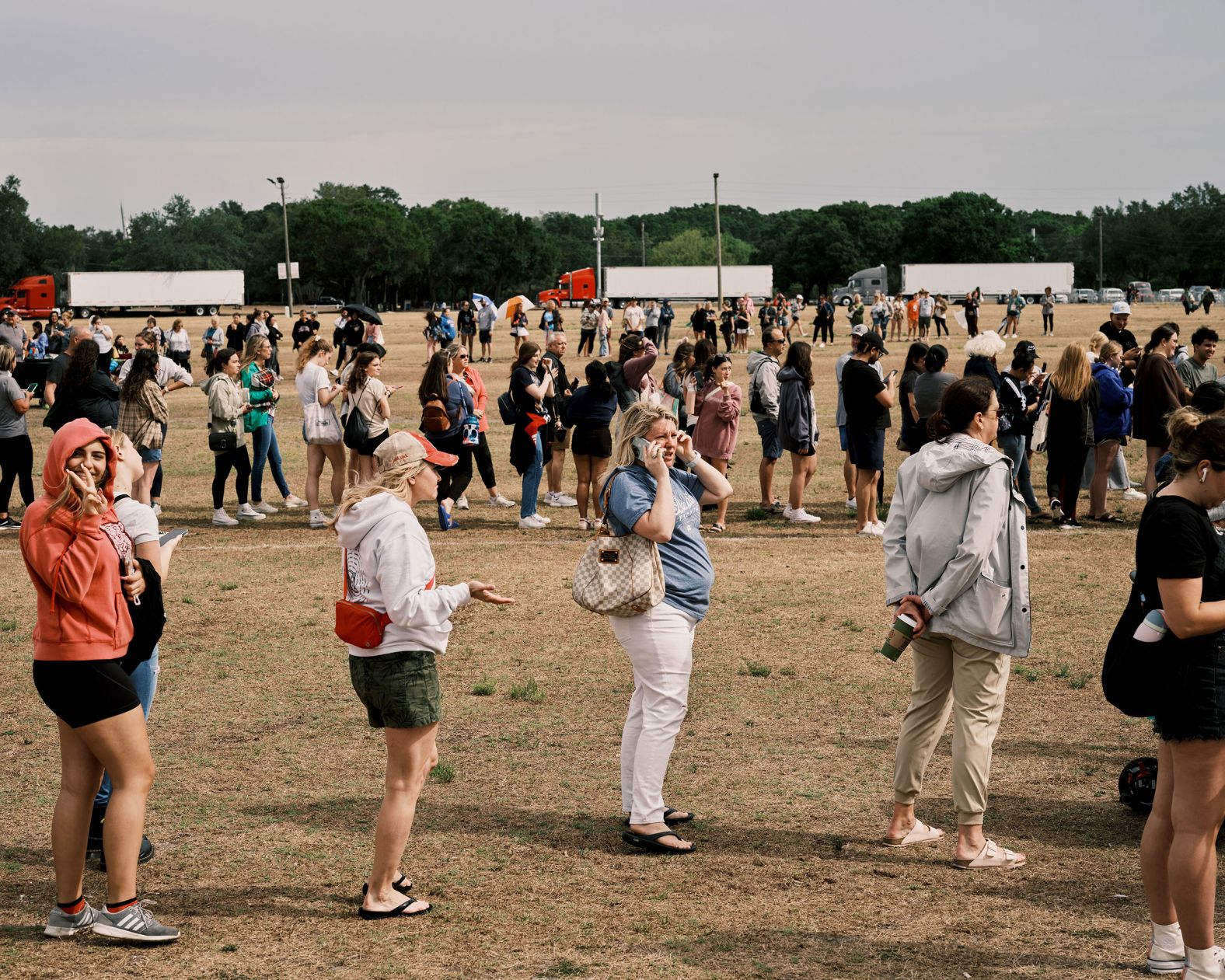 Fans wait in line to buy tour merchandise outside Raymond James Stadium in Tampa, Florida, in April 2023.