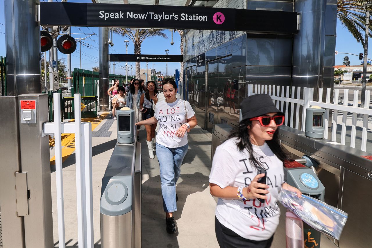 "Swifties" arrive at a metro station temporarily renamed "Speak Now/Taylor's Station" in Inglewood, California, on August 3.