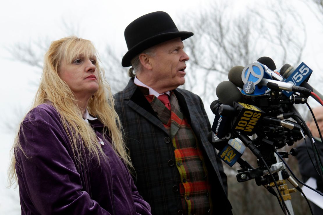 Mari Gilbert, left, with her lawyer John Ray at a news conference in 2011.  