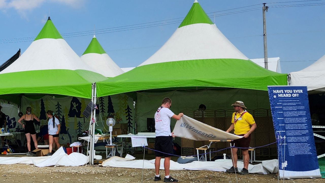 Staff for the UK booth of the 25th World Scout Jamboree prepare to leave the site in South Korea on August 5, 2023.
