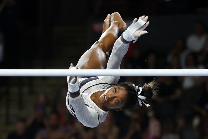 Biles competes in the uneven bars at the <a href="index.php?page=&url=https%3A%2F%2Fwww.cnn.com%2F2023%2F08%2F05%2Fsport%2Fsimone-biles-gymnastics-return-spt-intl%2Findex.html" target="_blank">Core Hydration Classic</a> in August 2023. It was her first competitive event since 2021, and she won the all-around.