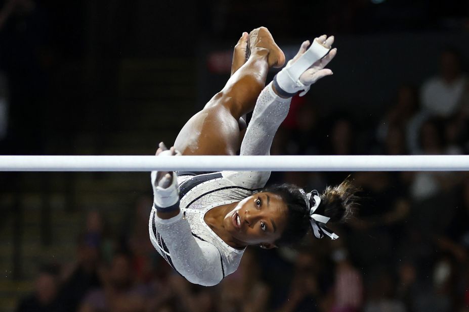 Biles competes in the uneven bars at the <a href="https://www.cnn.com/2023/08/05/sport/simone-biles-gymnastics-return-spt-intl/index.html" target="_blank">Core Hydration Classic</a> in August 2023. It was her first competitive event since 2021, and she won the all-around.