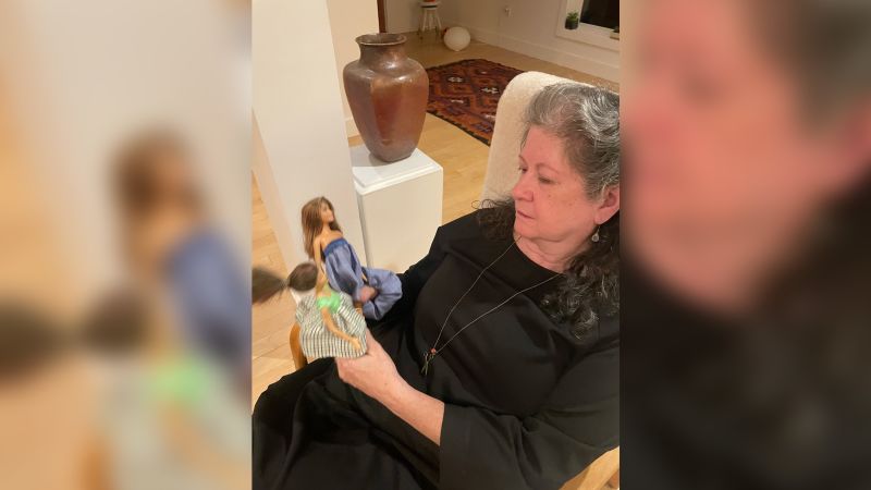NextImg:New York woman breathes new life into discarded Barbies to help migrant girls find hope | CNN