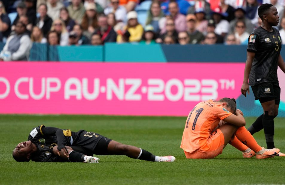 South Africa's Bambanani Mbane grimaces after colliding with the Netherlands' Lieke Martens. She was taken off on a stretcher shortly after.