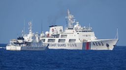 In this June 30, 2023, photo provided by the Philippine Coast Guard, a Chinese Coast Guard ship, right, allegedly obstructs Philippine Coast Guard vessel Malabrigo as it provided support during a Philippine Navy re-supply mission near Second Thomas Shoal, South China Sea. (Philippine Coast Guard via AP)