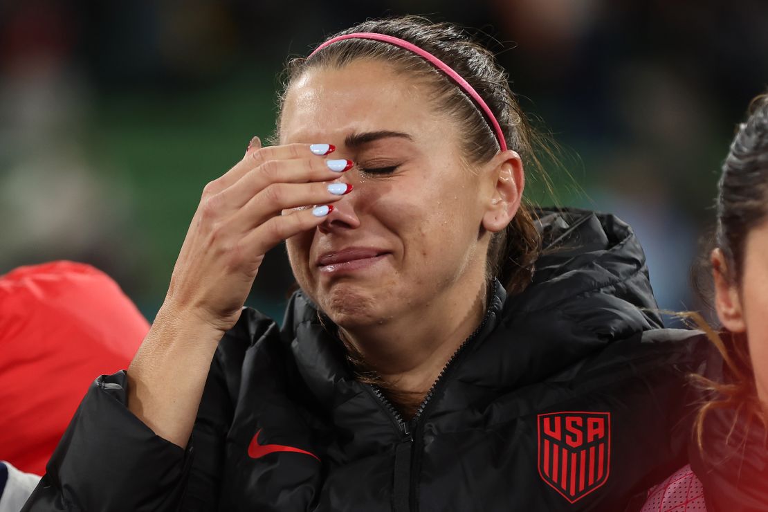 Alex Morgan reacts after the US was knocked out the World Cup.