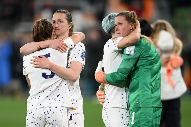 US players comfort one another after <a href="index.php?page=&url=https%3A%2F%2Fwww.cnn.com%2F2023%2F08%2F05%2Ffootball%2Fusa-sweden-womens-world-cup-2023-spt-intl%2Findex.html" target="_blank">being eliminated by Sweden in a penalty shootout</a> on August 6. The United States won the last two tournaments.