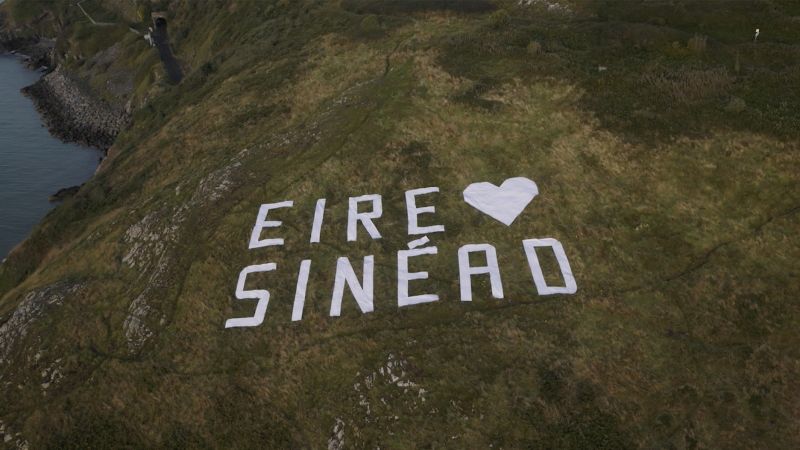 NextImg:Tribute to Sinéad O'Connor appears on Irish hillside ahead of funeral | CNN