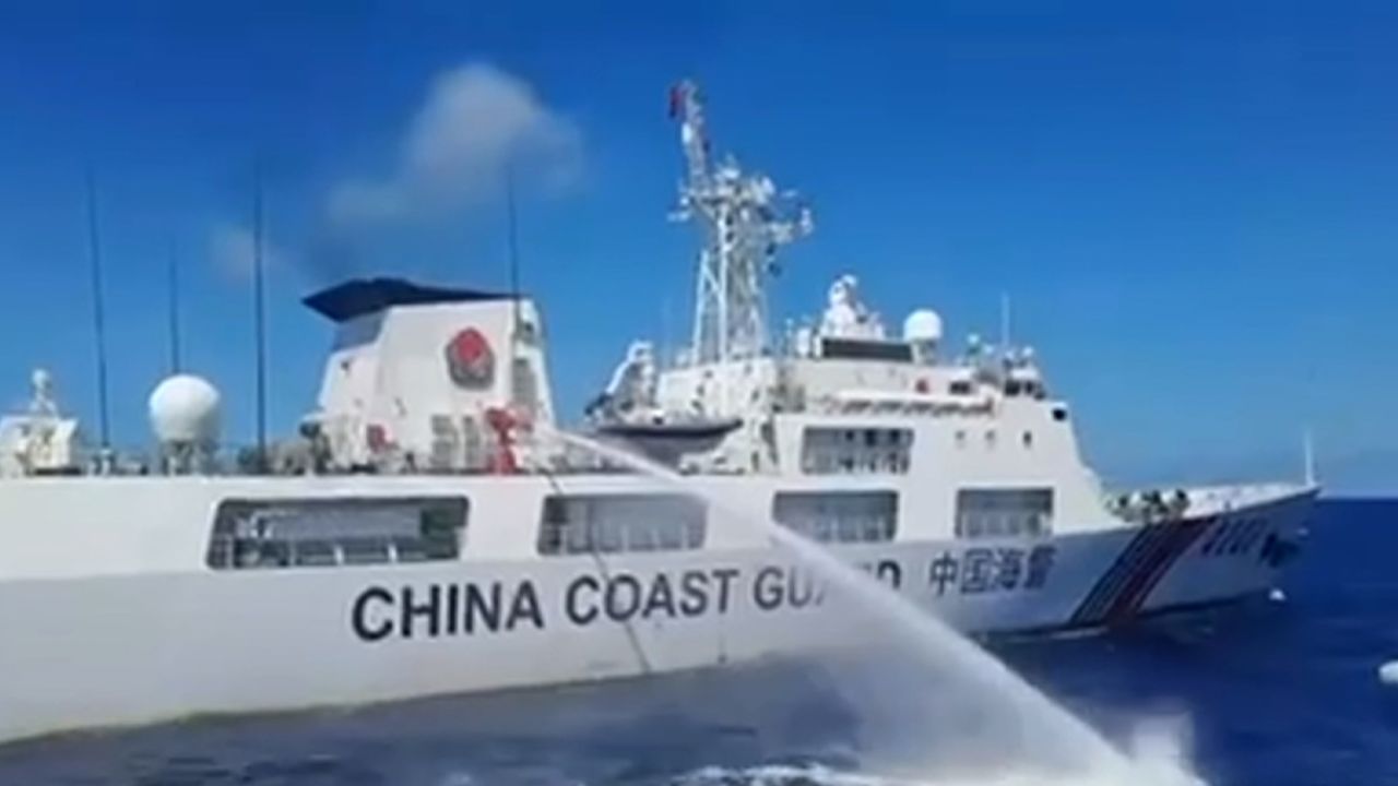 The Philippines has accused Chinese Coast Guard ships of firing water cannons and making "dangerous maneuvers" at its ships in the South China Sea.