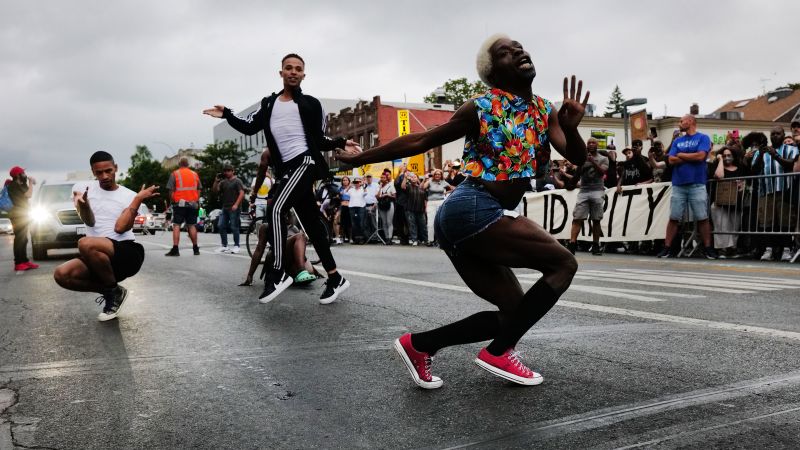 NextImg:O'Shae Sibley's killing unites New York's Black LGBTQ community in grief and defiance | CNN