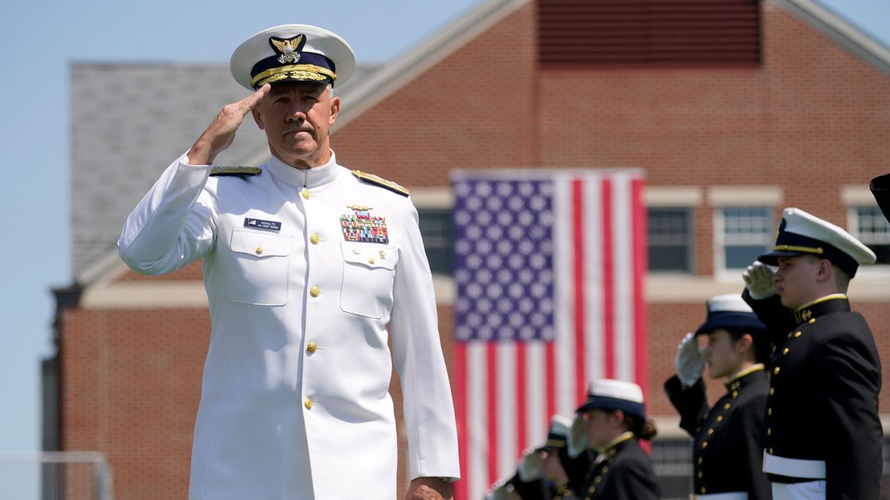 In this May 2021 photo, Adm. Karl Schultz arrives at the commencement for the United States Coast Guard Academy in New London, Connecticut. 