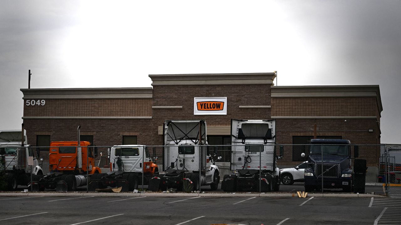 Trucks and trailers sitting in a Yellow Corp. facility lot in Las Vegas on July 31, which closed after the company ceased all operations.