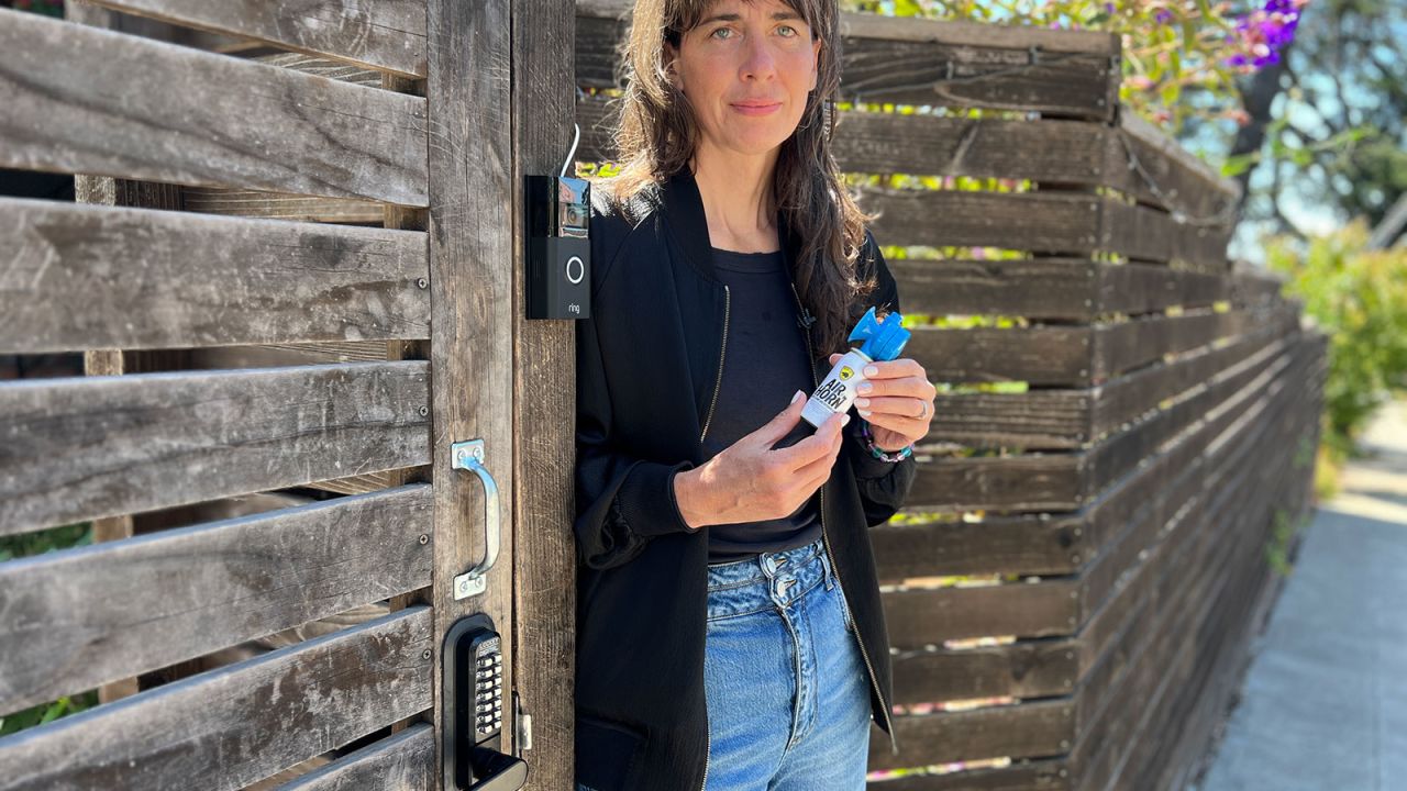 Toni Bird holds an air horn, which Oakland Police suggested could scare away criminals and alert her neighbors.
