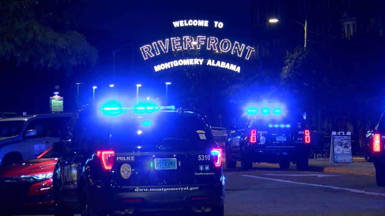Police respond to a riverfront dock in Montgomery, Alabama, after a fight.