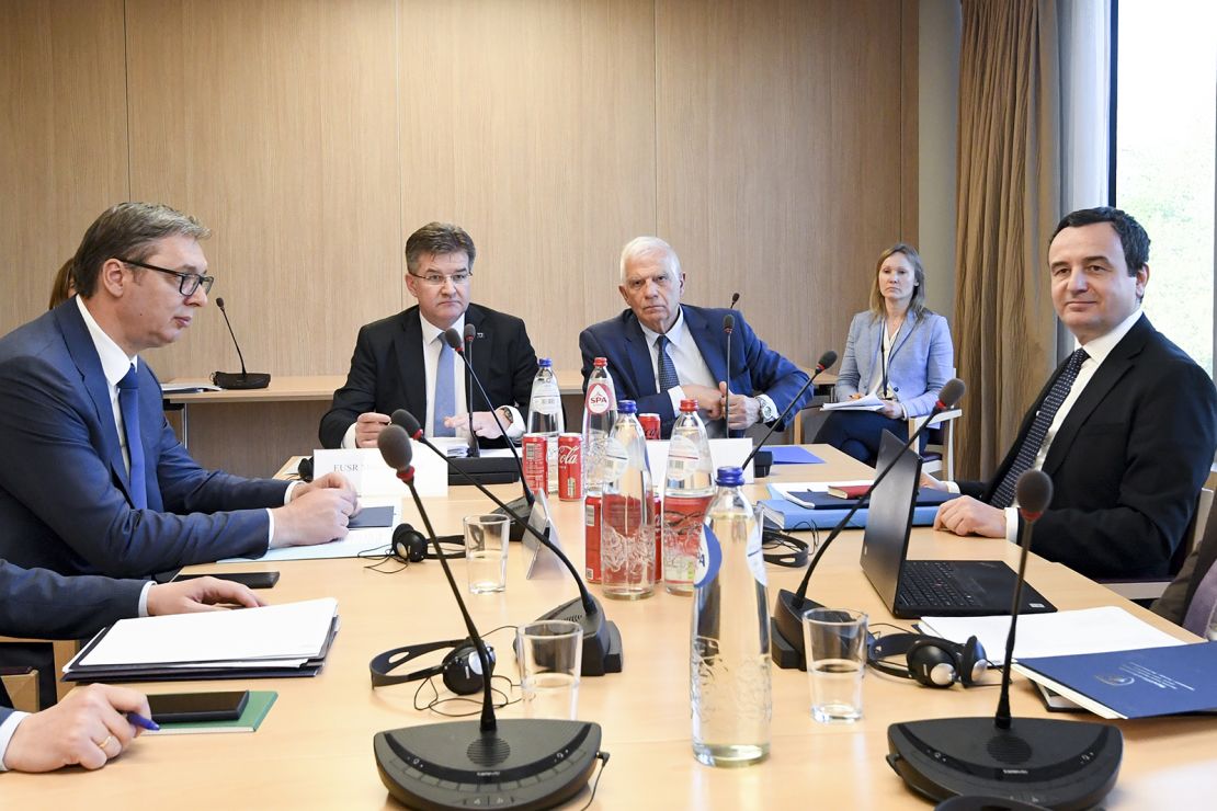 Serbia's Aleksandar Vucic, left, and Kosovo's Prime Minister Albin Kurti, right, at an EU-facilitated meeting in Brussels, Belgium, on May 2, 2023.
