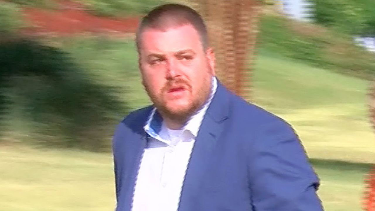 In this image taken from video, Christian Dedmon walks into the federal courthouse in Jackson.