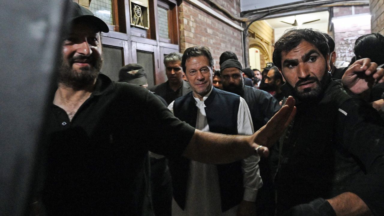 Former Pakistan's Prime Minister Imran Khan leaves after appearing at the high court in Lahore on March 17, 2023. 