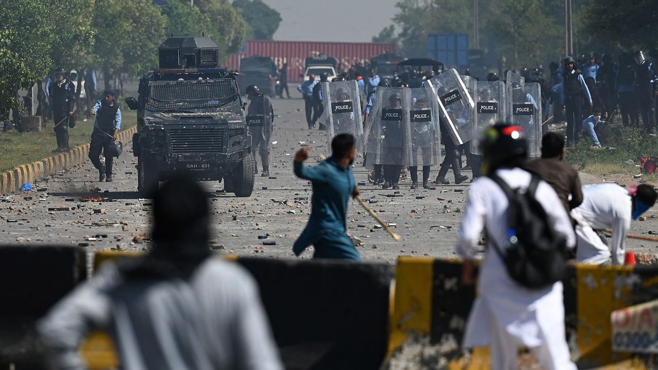 PTI supporters clash with police during a protest against the arrest of Imran Khan, in Islamabad on May 10, 2023.