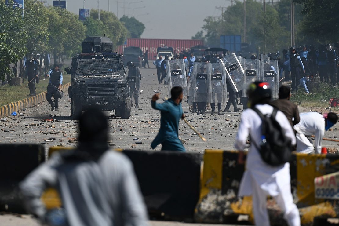 PTI supporters clash with police during a protest against the arrest of Imran Khan, in Islamabad on May 10, 2023.