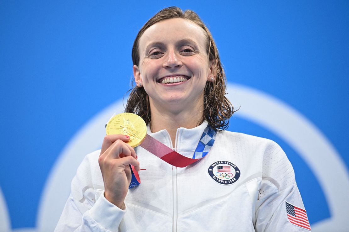 Gold medallist USA's Kathleen Ledecky poses with her medal after the final of the women's 800m freestyle swimming event during the Tokyo 2020 Olympic Games at the Tokyo Aquatics Centre in Tokyo on July 31, 2021. (Photo by Oli SCARFF / AFP) (Photo by OLI SCARFF/AFP via Getty Images)