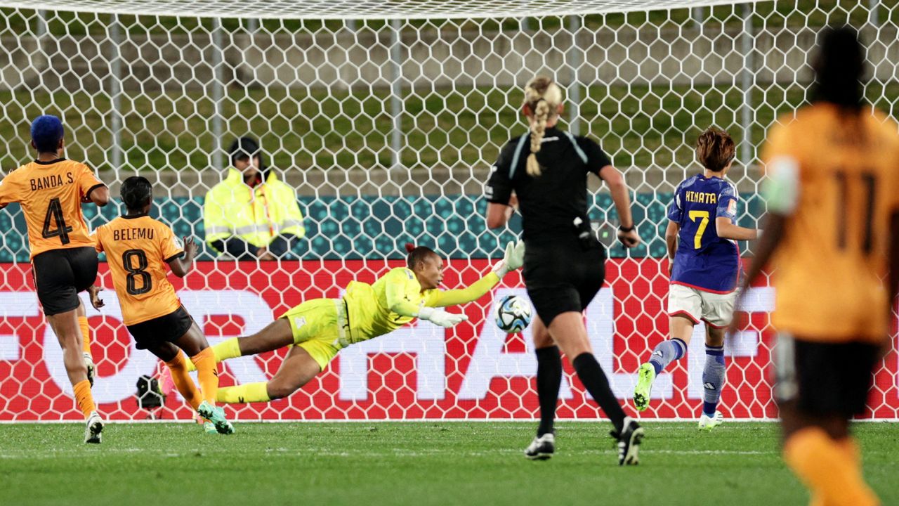 Japan's Hinata Miyazawa scores her team's first goal of a 5-0 domination of Zambia.