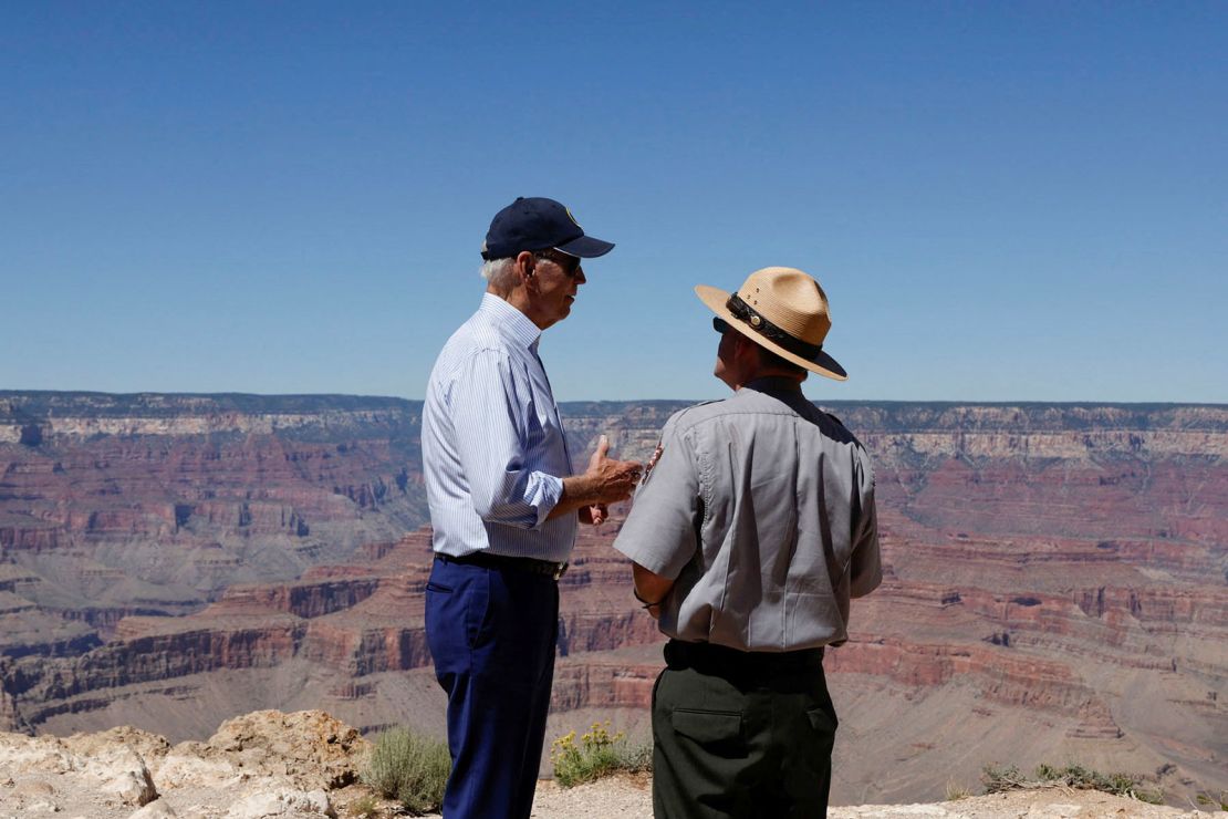 Biden speaks with Ed Keable, superintendent of Grand Canyon National Park, on Tuesday.