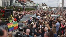 Fans of singer Sinéad O'Connor line the streets for a "last goodbye" to the Irish singer as her funeral cortege passes through her former hometown of Bray, Co Wicklow. 