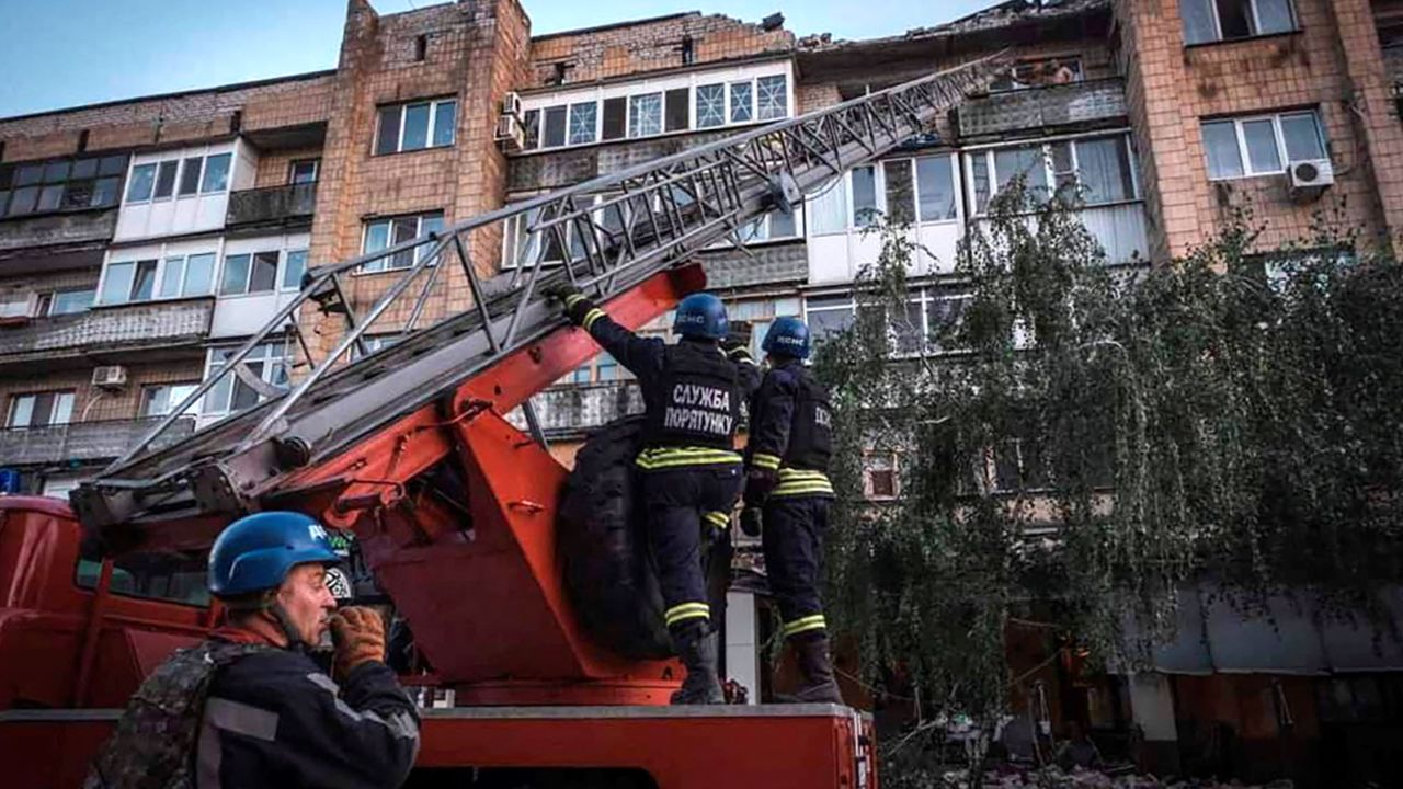 Rescuers work at the site of a destroyed building on Monday.