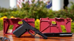 Parts of a ghost gun kit are on display at an event held by President Joe Biden to announce measures to fight ghost gun crime, at the White House in Washington, DC, in April 2022.
