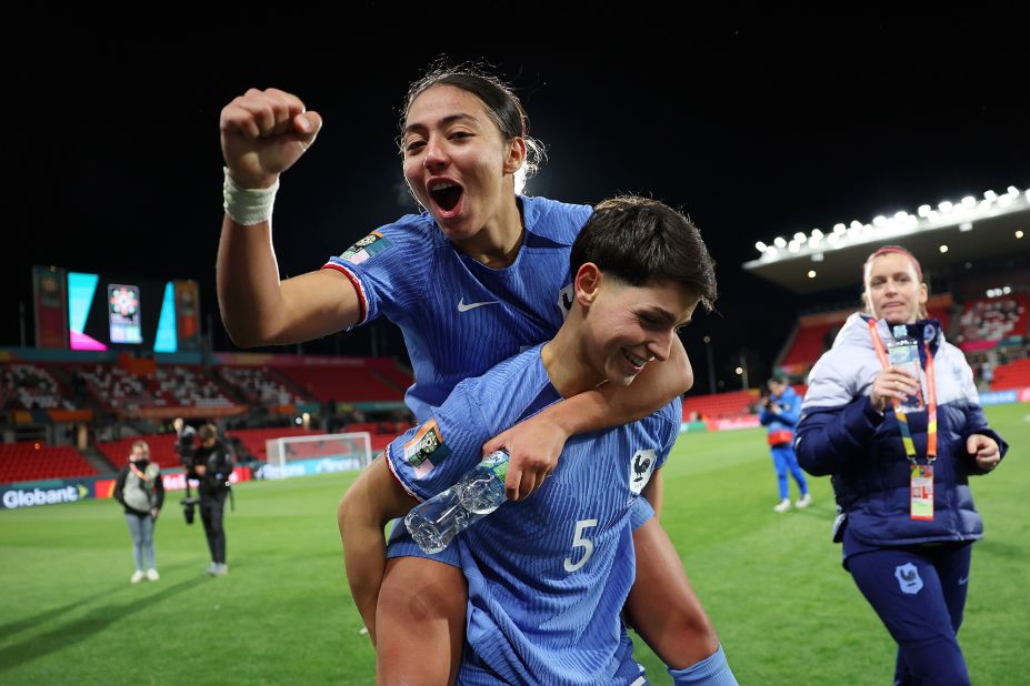 France's Selma Bacha, left, and Élisa De Almeida celebrate after a<a href="https://cnn.com/2023/08/07/football/colombia-jamaica-france-morocco-womens-world-cup-spt-intl/index.html" target="_blank"> 4-0 victory against Morocco</a> in the round of 16.