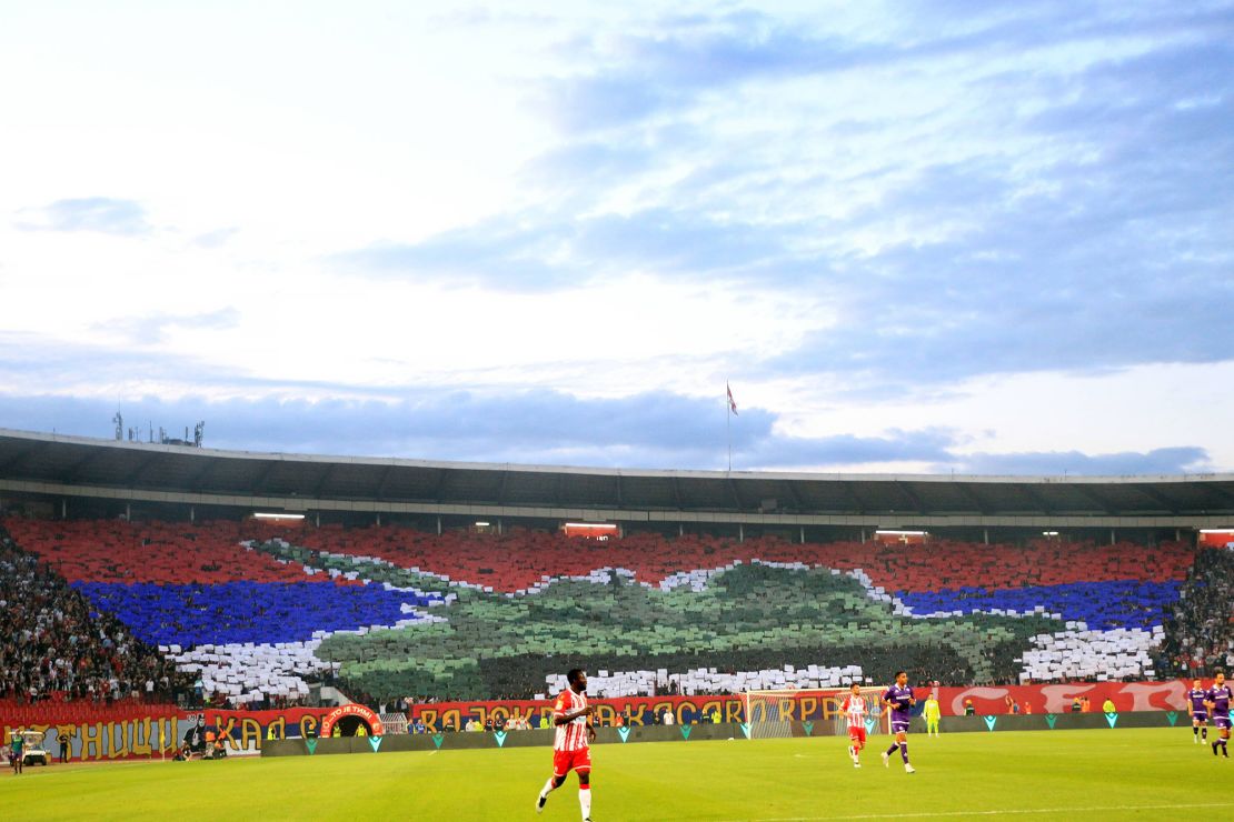 Red Star fans display a tifo with the Serbian flag, a tank T-84 and an inflammatory message, July 26, 2023.