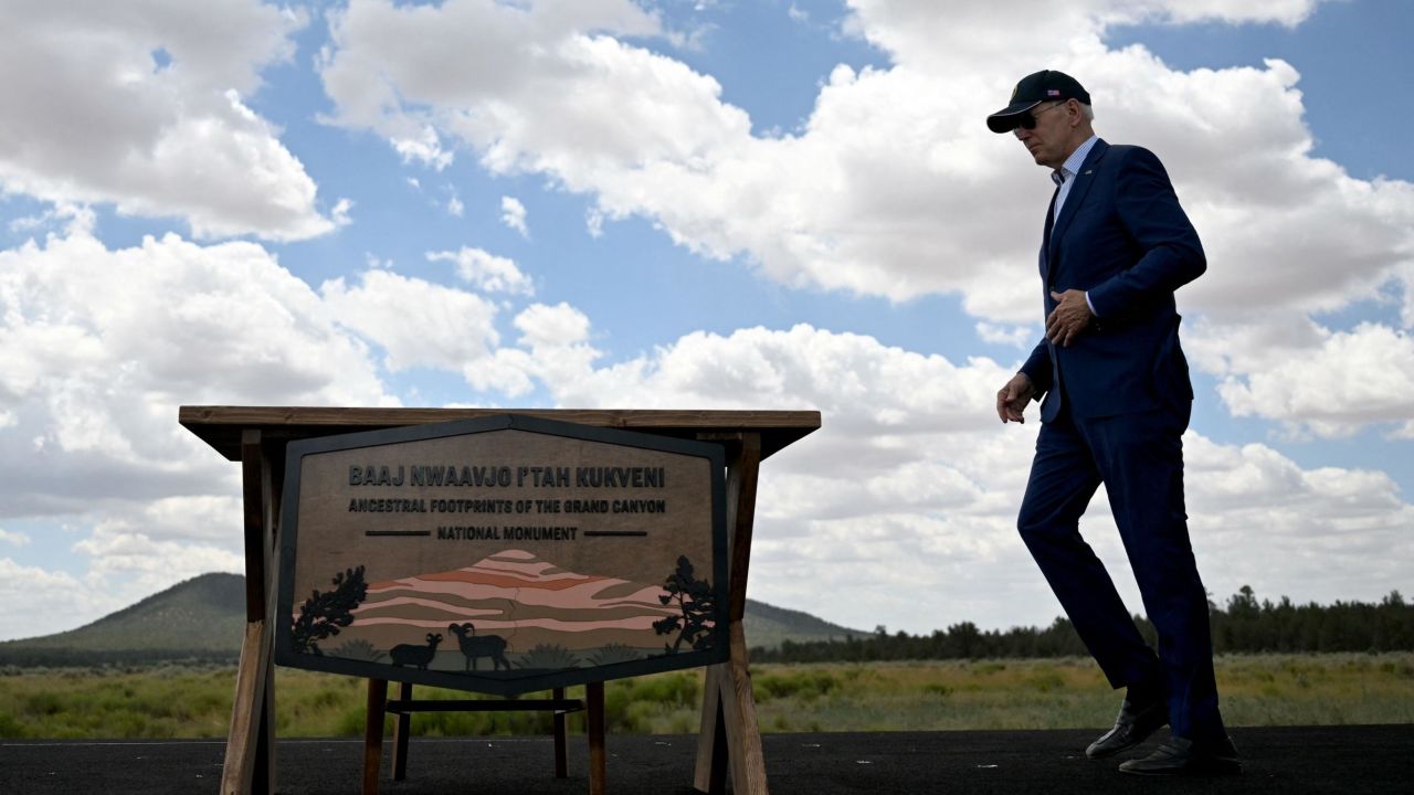 US President Joe Biden walks to sign a proclamation to designate Baaj Nwaavjo I'tah Kukveni  Ancestral Footprints of the Grand Canyon National Monument, at Red Butte Airfield, 25 miles (40kms) south of Tusayan, Arizona, on August 8, 2023.