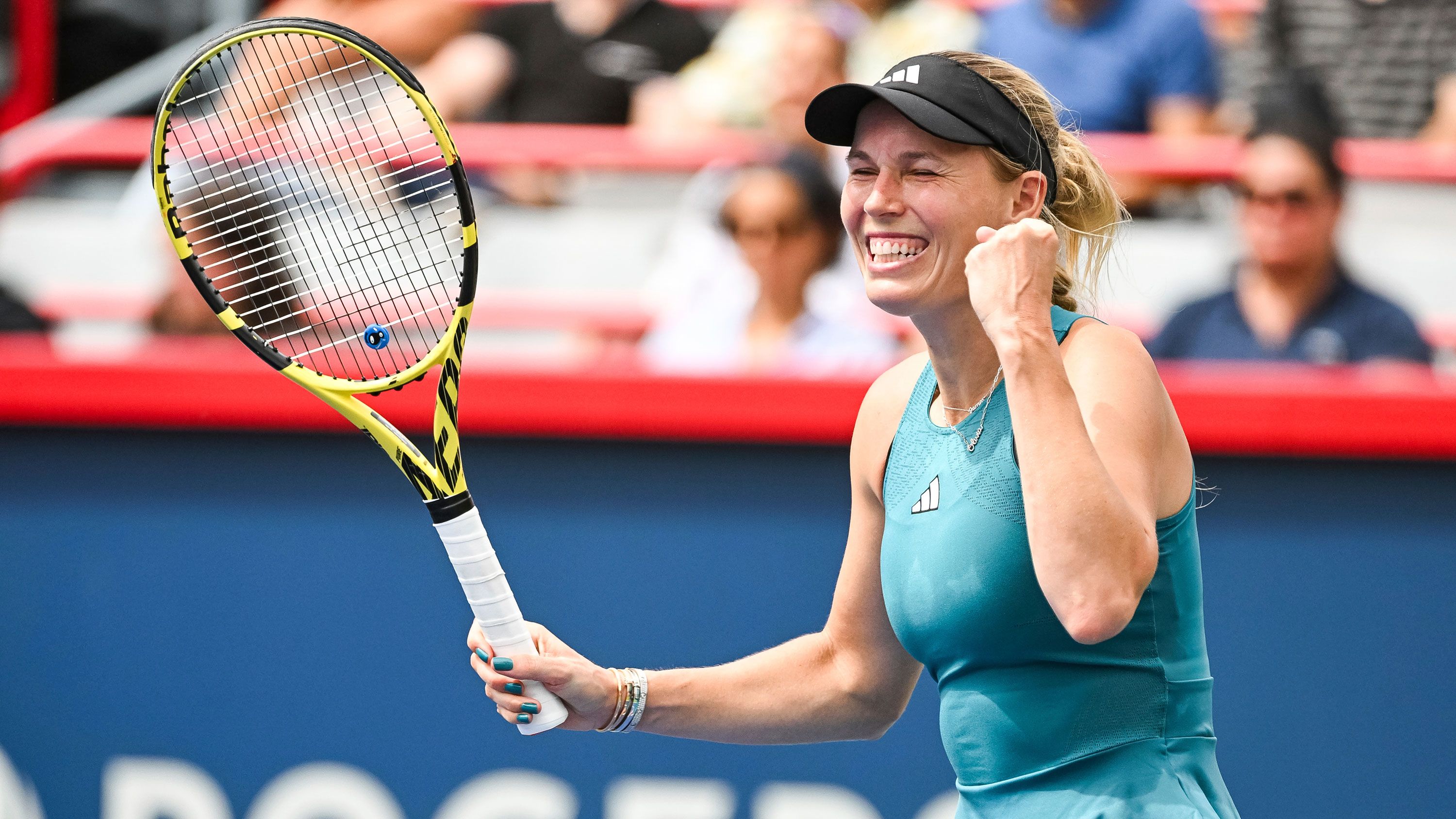 Caroline Wozniacki makes winning return to tennis after three-year