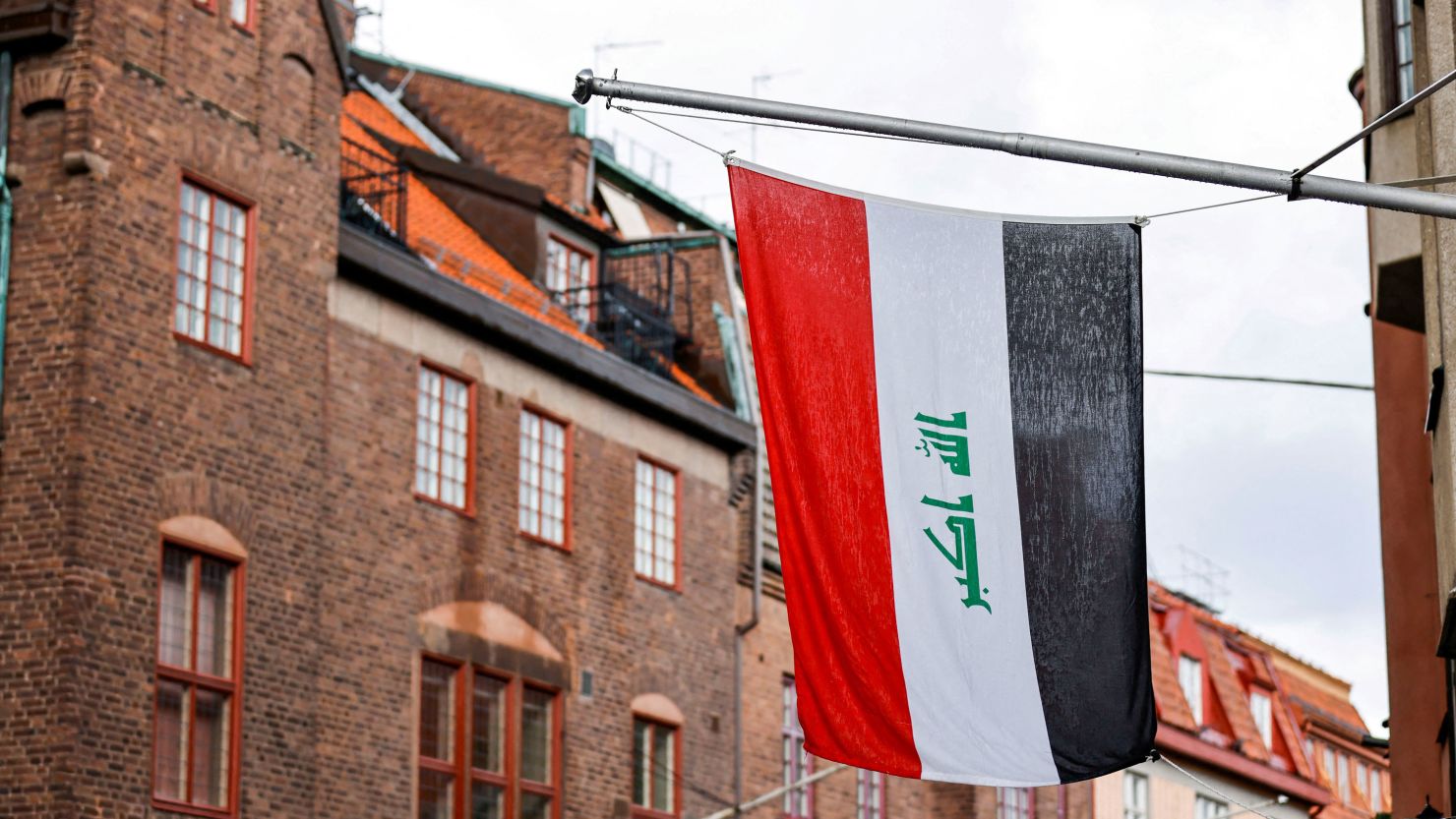 An Iraqi national flag is seen near the Iraqi embassy ahead of a demonstration in Stockholm, Sweden on July 20, 2023. 