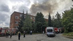 In this photo taken from video and released by the Administration of Sergiev Posad municipal district of Moscow region telegram channel on Wednesday, Aug. 9, 2023, smoke rises from the Zagorsk Optical and Mechanical Plant in the city of Sergiev Posad, Moscow Region, about 65 km (41miles) north-east of Moscow, Russia. The governor of the Moscow region, Andrei Vorobyov, said at least 31 people were injured after a warehouse containing pyrotechnics exploded at a factory north of Moscow. Russian social media channels shared footage which showed huge plumes of smoke billowing into the air and shattered windows. (Administration of Sergiev Posad municipal district of Moscow region telegram channel via AP)
