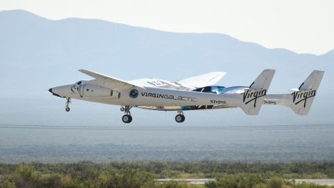 The Virgin Galactic SpaceShipTwo space plane Unity flies at Spaceport America, near Truth and Consequences, New Mexico on July 11, 2021  before travel to the cosmos. Billionaire Richard Branson takes off on July 11, 2021 from a base in New Mexico aboard a Virgin Galactic vessel bound for the edge of space, a voyage he hopes will lift the nascent space tourism industry off the ground.A massive carrier plane made a horizontal take-off from Space Port, New Mexico at around 8:40 am Mountain Time (1440 GMT) and will ascend for around an hour to an altitutude of 50,000 feet (15 kilometers). The mothership will then drop a rocket-powered spaceplane called VSS Unity, which will ignite its engine and ascend at Mach 3 beyond the 50 miles (80 kilometers) carrying two pilots and four passengers, including Branson. (Photo by Patrick T. FALLON / AFP) (Photo by PATRICK T. FALLON/AFP via Getty Images)