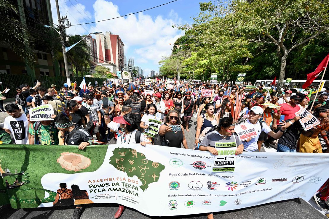 Indigenous people from Amazon countries and members of social movements take part in the March of the Peoples of the Earth for the Amazon in Belém, Para State, Brazil, on August 8.