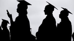 New graduates line up before the start of a community college commencement in East Rutherford, New Jersey, in May 2018.