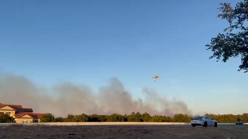 NextImg:Austin-area wildfire has destroyed an apartment building and damaged at least 3 others | CNN