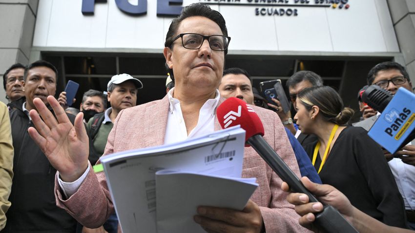 Former Assembly member and now presidential candidate, Fernando Villavicencio, speaks to journalists upon his arrival at the Attorney General's Office in Quito on August 8, 2023. Fernando Villavicencio asked the Attorney General's Office to investigate former officials related to the oil sector of the governments of Rafael Correa, Lenín Moreno, and Guillermo Lasso as part of a criminal complaint that he filed on Tuesday. (Photo by Rodrigo BUENDIA / AFP) (Photo by RODRIGO BUENDIA/AFP via Getty Images)