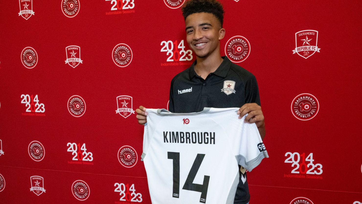 Da'vian Kimbrough, 13, holds up his jersey after signing contract with the Sacramento Republic of the second-tier League Championship of the United Soccer League, Tuesday, Aug. 8, 2023,  in Sacramento, Calif. (Paul Kitagaki Jr./The Sacramento Bee via AP)