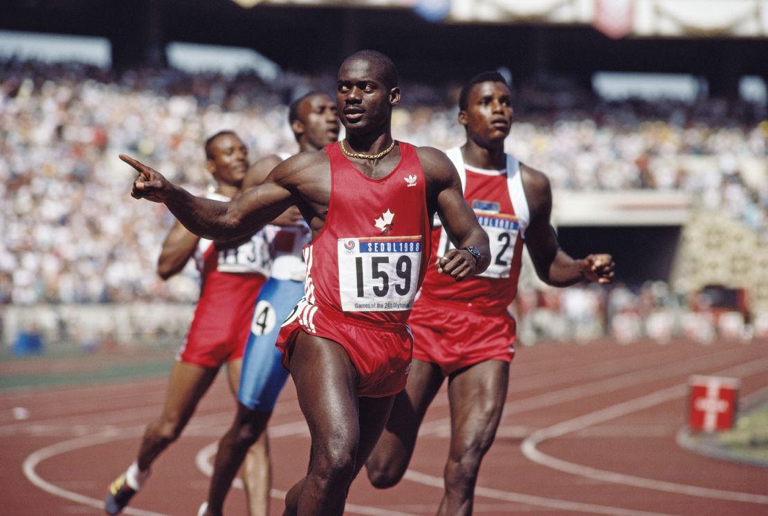 Ben Johnson of Canada celebrates winning gold in the Men's 100 metres final on 24 September 1988 during the XXIV Olympic Games at the Seoul Olympic Stadium in Seoul, South Korea. Ben Johnson was later disqualified for the illegal use of performance enhancing drugs.(Photo by Mike Powell/Getty Images)